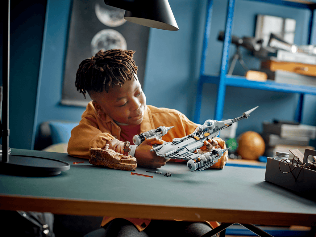 lifestyle - child playing with the starfighter