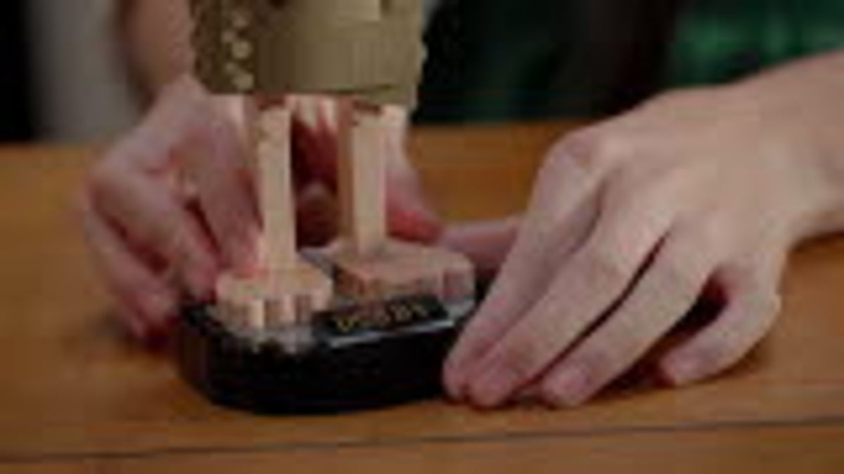 lifestyle - hands holding the Dobby model